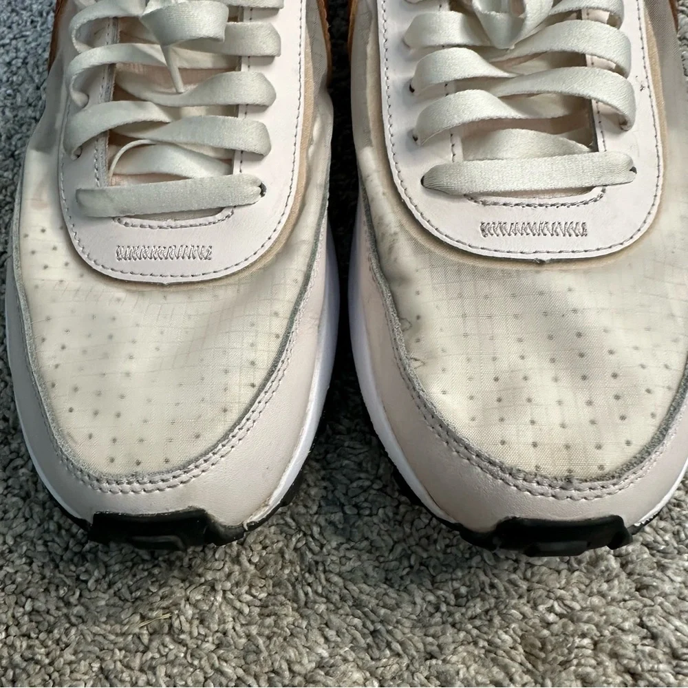 Nike Women's Sneakers in White with Metallic Rose Gold Swoosh
